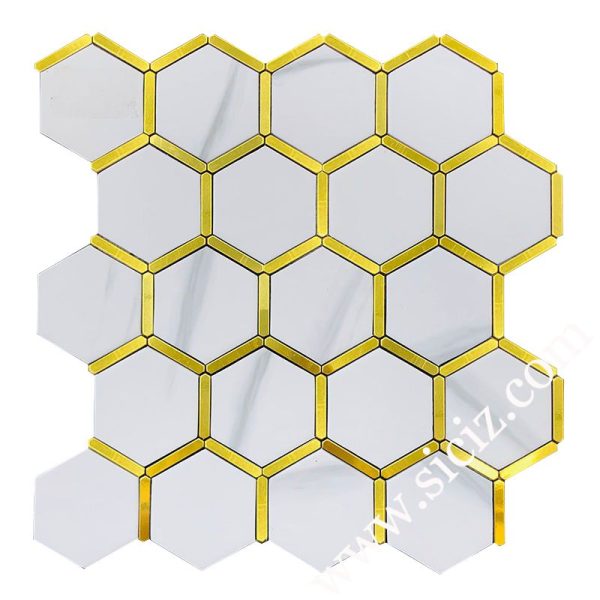 white hexagonal marble mosaic tile with golden metal frame