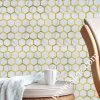 white hexagonal marble mosaic tile with golden metal frame